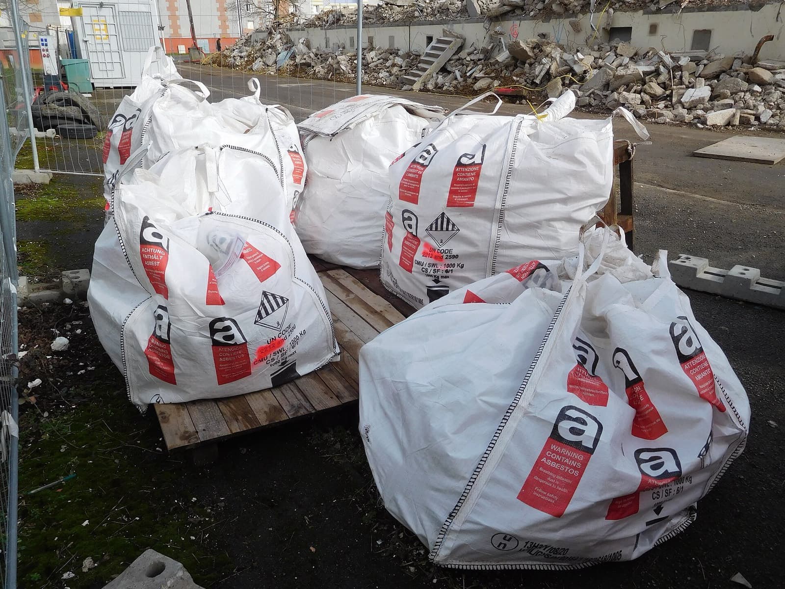 Approved bags of asbestos waste on a pallet