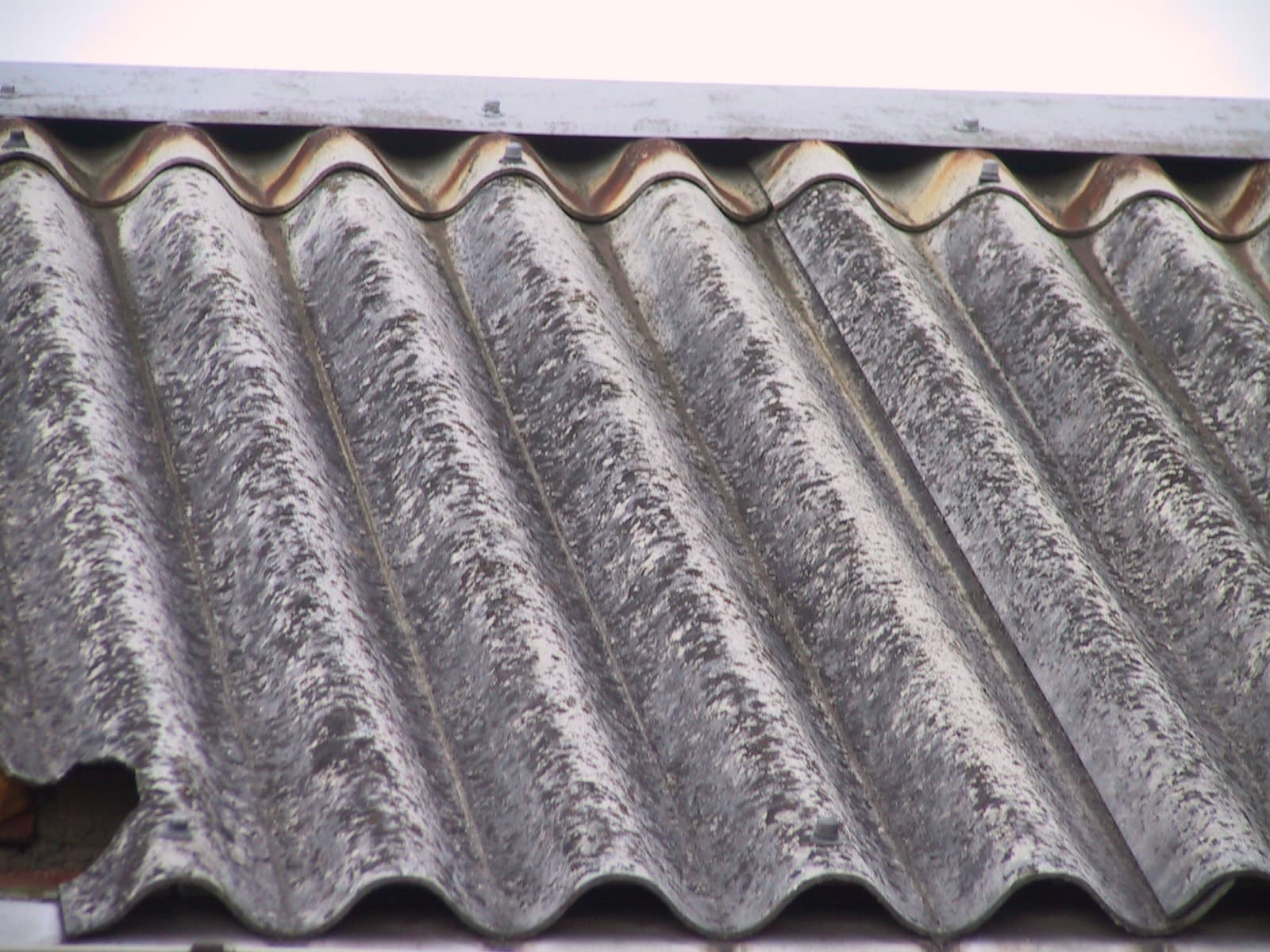 Weathered corrugated fibre-cement sheets, close up